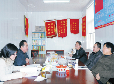 區(qū)教育局黨委委員、副局長甘力平一行視察我校